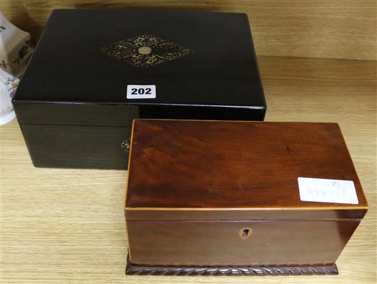 An ebonised mother of pearl box and tea caddy